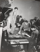 Philip Corner, Emmett Williams, George Maciunas, Benjamin Patterson, Dick Higgins, Alison Knowles. Philip Corner's Piano Activities, performed by Philip Corner, George Maciunas, Emmett Williams, Benjamin Patterson, Dick Higgins, and Alison Knowles during Fluxus Internationale Festspiele Neuester Musik, Hörsaal des Städtischen Museums, Wiesbaden, Germany, September 1, 1962. 1962